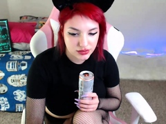 Amateur redhead Dasha with glasses masturbates