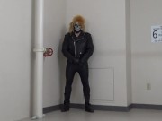 masked leather man quickly shoots his load in hotel stairway
