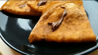 "Crepes with cream" - cuming on food