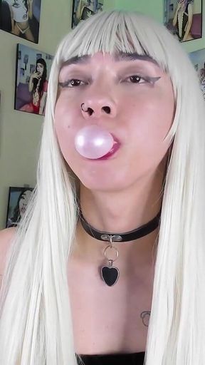 Cute teenager playing with bubble gum bombs