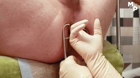Spread slaves asshole and massage his prostate with a vib