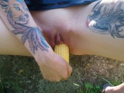 Shameless Lucy Ravenblood fucking pussy with corn in public