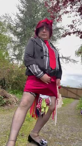 Dressed in an outfit with a short red skirt for the evening