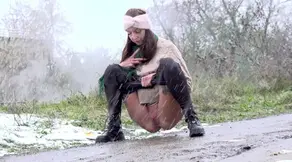 Strong golden stream from sexy brunette