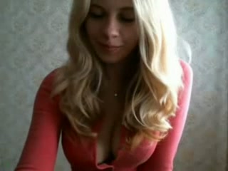 Blonde Barbie doll showing her goodies on webcam