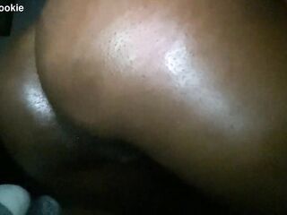 Amateur Black Gal with oiled booty fingers constricted vagina