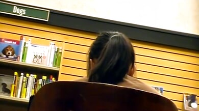 Candid foot fetish moment with a teen girl in the library