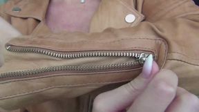 I zip and unzip my favorite red leather jacket b