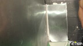 Horny guy sucks a big dick through glory hole and swallows cum