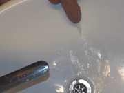 Peeing in the bathroom sink