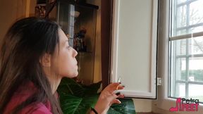 Brunette beauty adores cigars