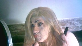 Ugly old sissy spunk bucket slag Sarah tries to make herself attractive to men by applying makeup to her ugly slag face