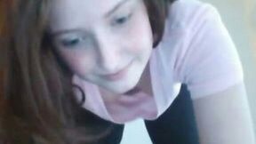 Charming redhead teen shows her pussy for the webcam