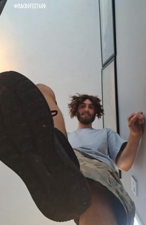 Giant master stomps on a tiny with shoes!