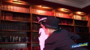 Busty blonde babe fucks with a big strap on dominant police woman