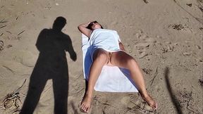 Stranger on a Nudist Beach