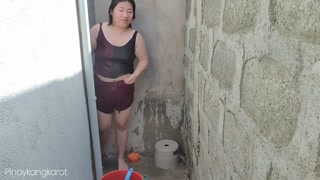 Filipina taking a bath outside the house got fuck