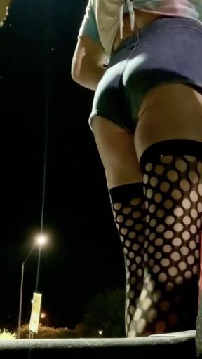 Sexy ass tight jean shorts and fishnets on outdoor display hot sissy TS