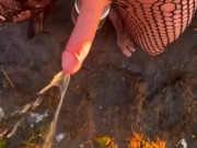 Public piss with hardon in body stocking