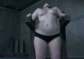 Busty and juicy blonde bimbo in black panties spanked hard in BDSM style