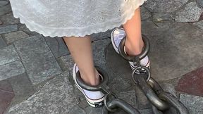 BLE02-A cute student girl from Asia put on 30 kilograms of shackles and walked in the park.