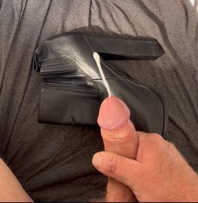 Cum on a black high heel boot