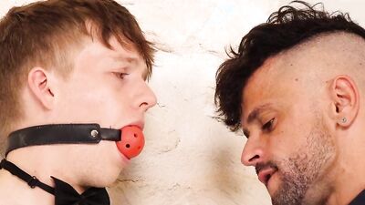 Bound and gagged guy is being punished by a perverted master