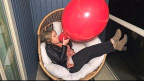 Massive Red Balloon Blow to Pop (B2P) in Leather jacket