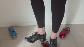smashing a die cast car to pieces with my pretty feet
