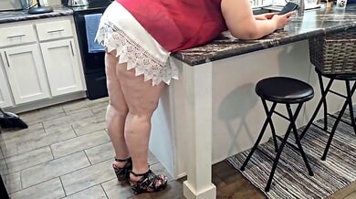 Voluptuous maid spreads for a muscular stud in a sleek kitchen