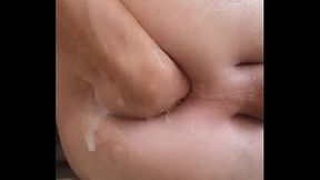 I shaved my ass and my big tattooed dick with holes. And then I easily fisting myself, which made me squirt.