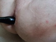 Guy play with ass toy.