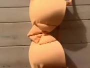 Cumshot on orange Bra