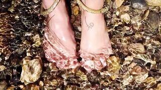 Ambling bootless in the sea. Fur Covered gams. Ankles jewelery.