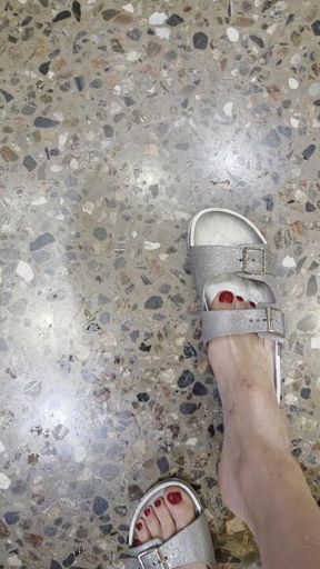 My sparkly silver sandals and perfect red toes all wet after the rain 👡💦🌧️