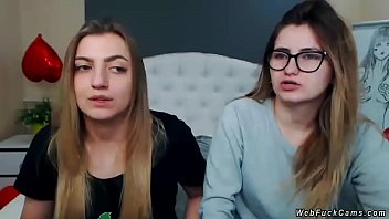Amateur teen lesbians strip, tie each other up on webcam