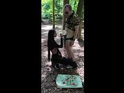 Female jogger gives a blowjob in the woods