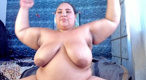 I undress very slowly in front of the camera