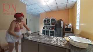 Nudist housekeeper Regina Noir cooking at the kitchen. Naked maid makes dumplings. Naked cooks. Bra1