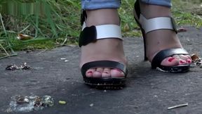 Outside roach crushing in high heels.