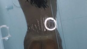 MILF Playing with the glass in the shower