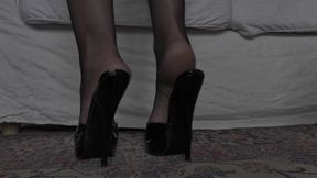 Goddess of High Heels Shows off Her Black Patent Leather Mules