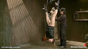 Bound In Straitjacket And Suspended