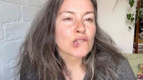 she is biting her checks and lips with sharp teeth aV