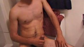 Marcus makes a manly impression as he slips away to the bathroom with his laptop to catch a little private time. He gets really into the porn he's watching and strips off his red boxers.