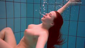 ”Czech girl Vesta enters swimming pool naked”