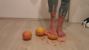 Stella crushing grapefruits barefoot