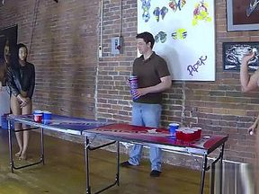 4 Beautiful girls play a game of strip beer pong