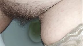 Hairy pussy pissing close up
