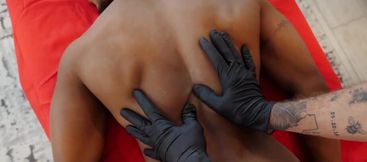 Erotic massage grants this naked ebony man the ultimate sensations
